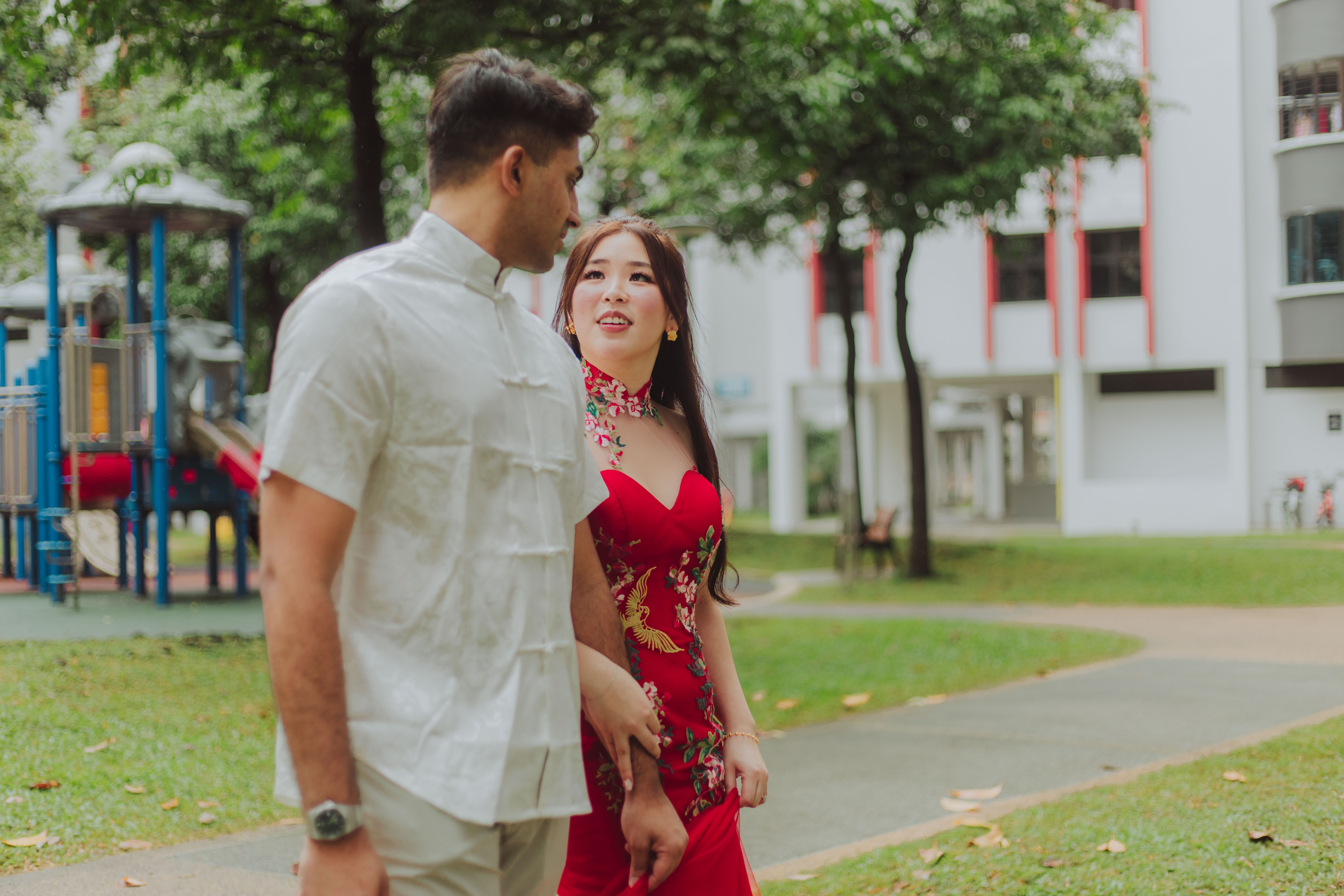 Multicultural garden wedding ceremony with Indian and Chinese traditions